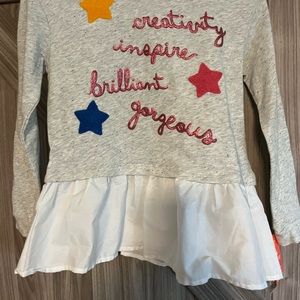 Girls long sleeve peplum shirt